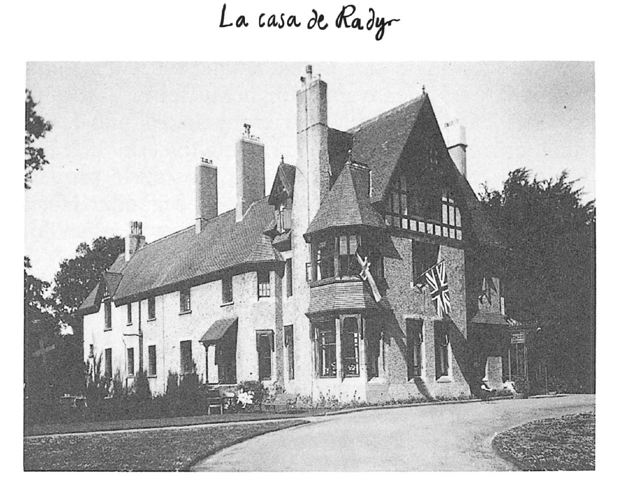 Fotografia d’una gran casa. A dalt hi posa «La casa de Radyr».